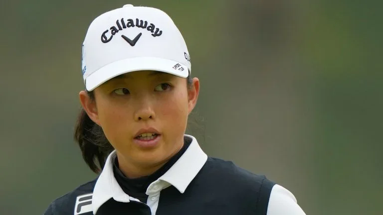 Ruoning Yin, of China, reacts after sinking a putt on the second hole during the final round of the Mizuho Americas Open